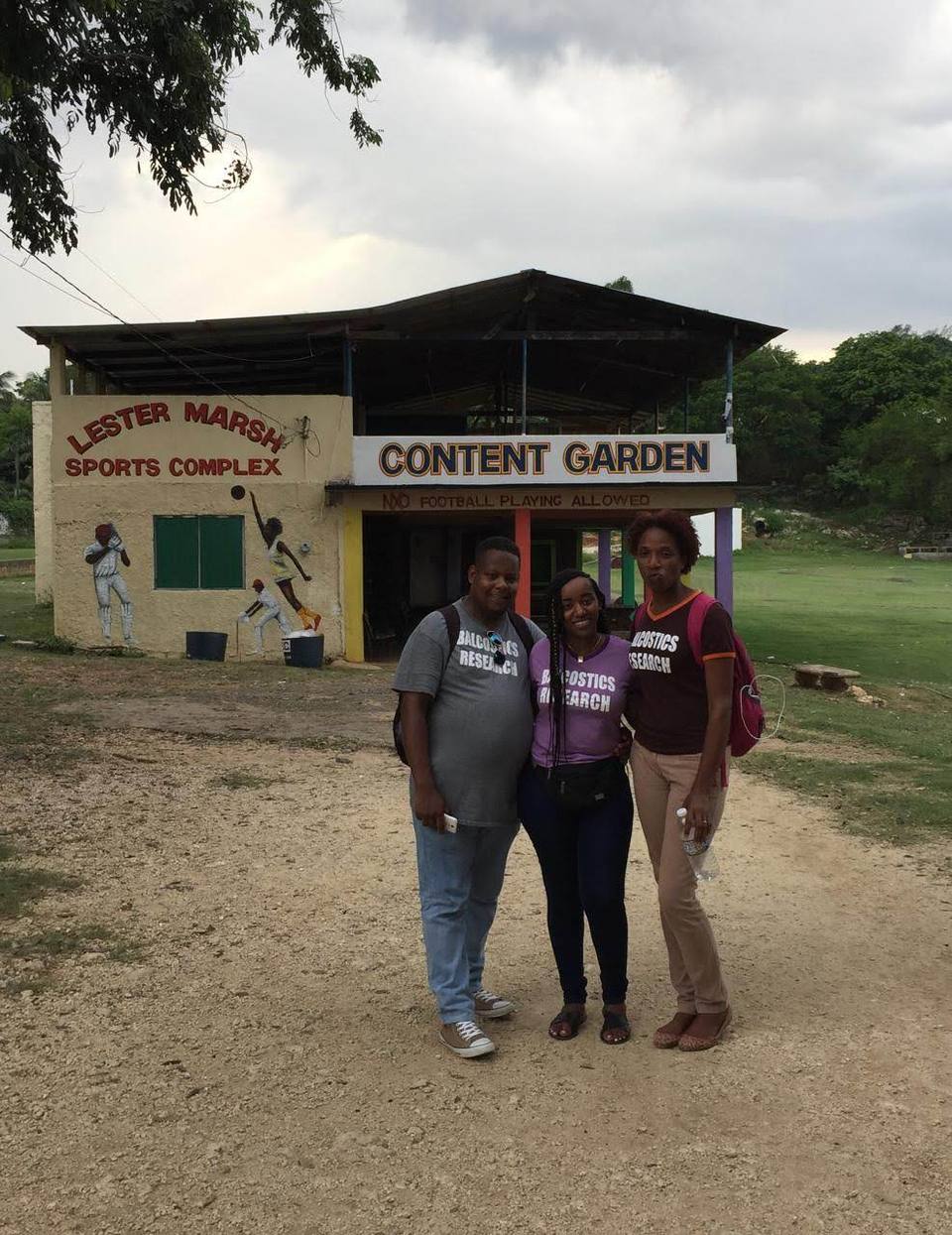 Three Balcostics Research interviewers outside the Lester Marsh Sports Complex
